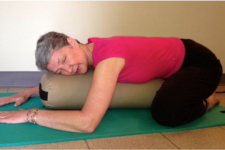 supported-childs-pose-restorative-yoga